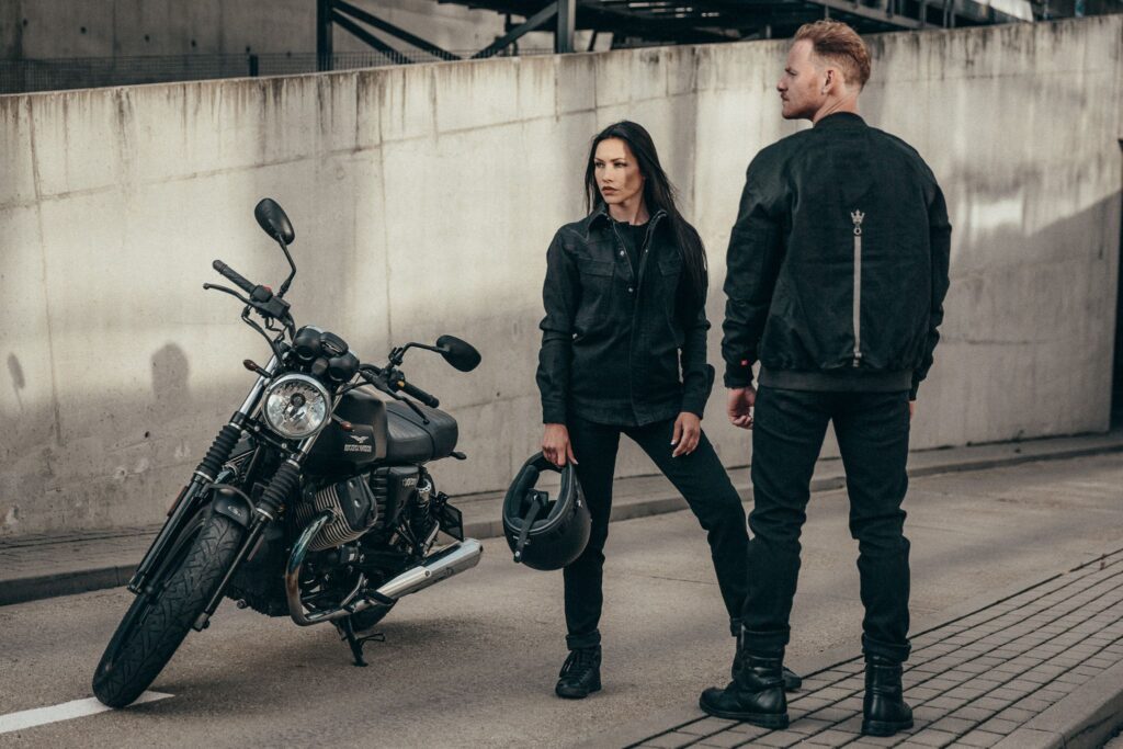 A couple wearing protective motorcycle boots