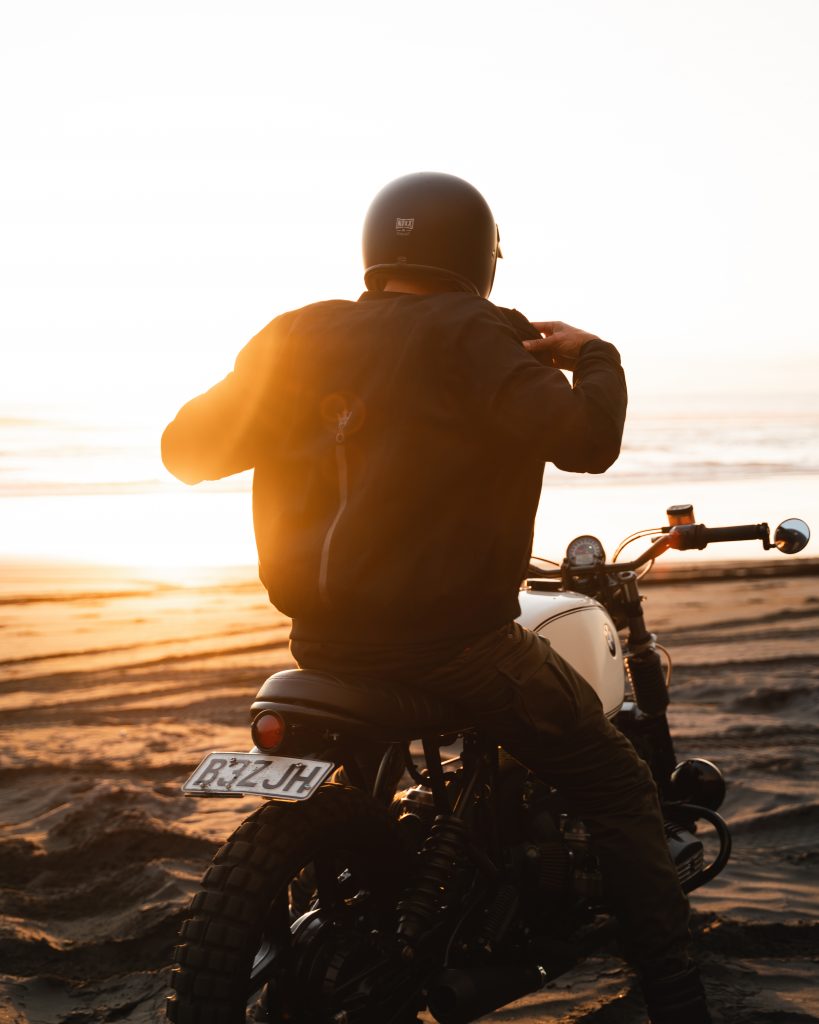 Dual sport motorcycle accessories and motorcycle in sunset