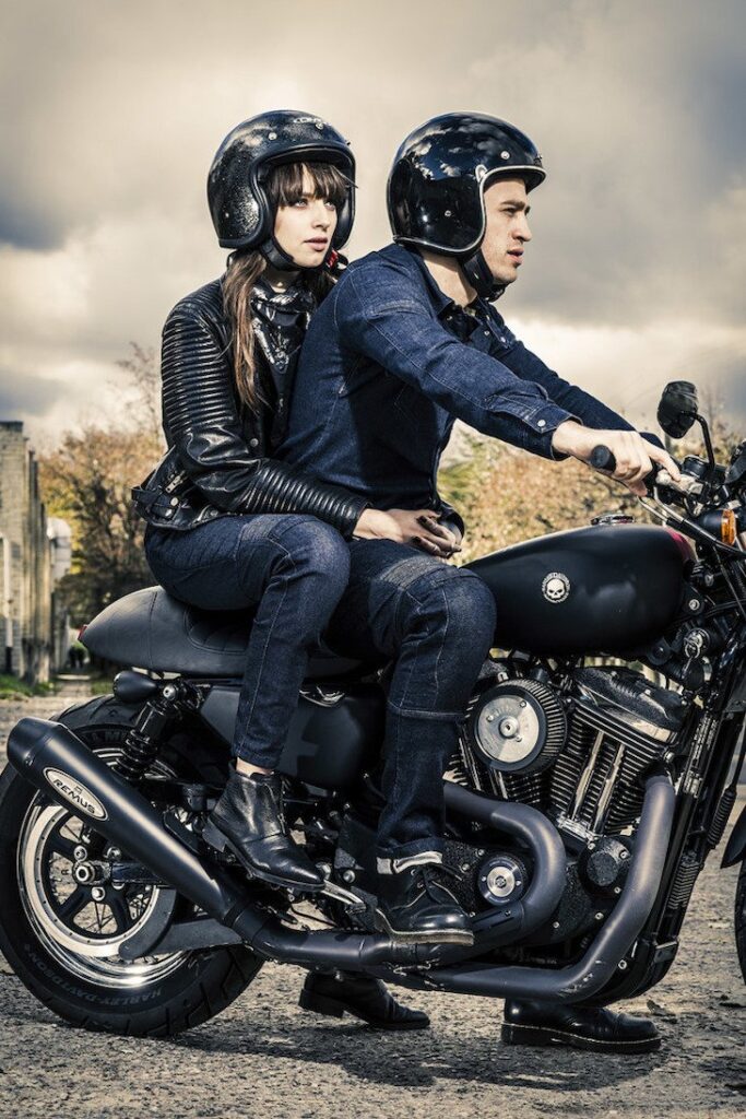 A couple wearing motorcycle jeans from Pando Moto