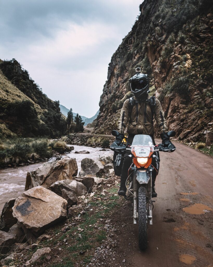 Riding motorcycle in dangerous mountains - photo 1