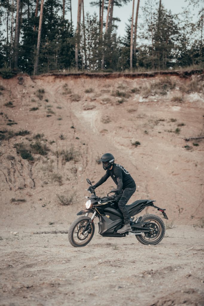 A motorcyclist in Dyneema jeans riding his dirt bike